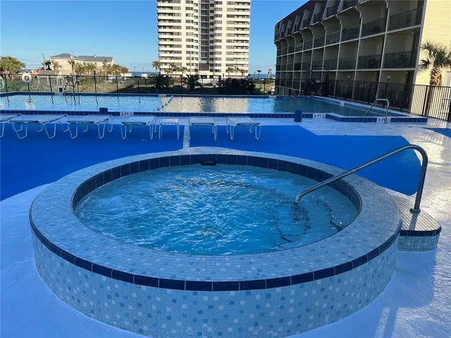 a view of a swimming pool with living room