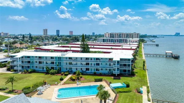 view of a balcony with chairs