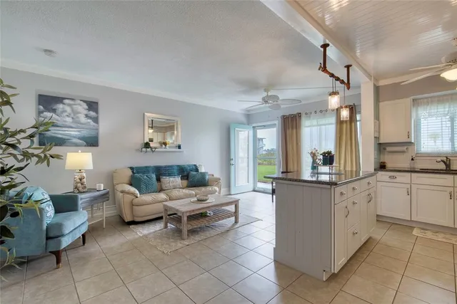 a kitchen with a cabinets and chairs