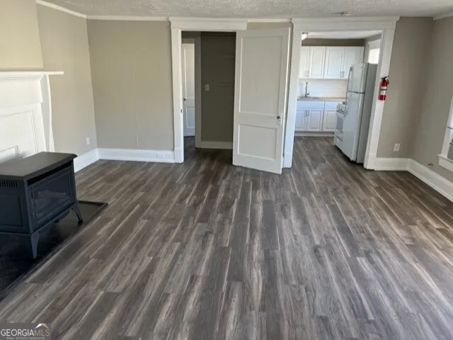 a view of livingroom with hardwood and front door