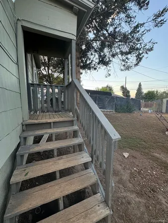 a view of balcony with furniture