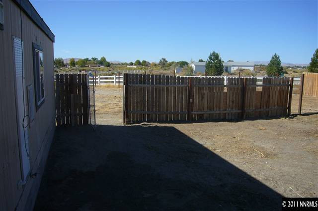 5990 Sarah Road Fallon, NV 89406 - Photo 11 of 12 a view of a backyard of a house