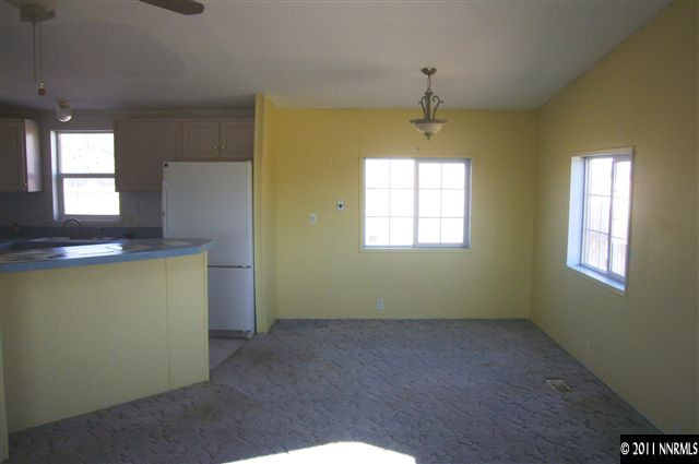 5990 Sarah Road Fallon, NV 89406 - Photo 3 of 12 a kitchen that has a lot of windows in it