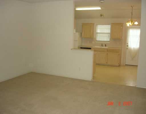7801 Wolf Drive Corpus Christi, TX 78414 - Photo 2 of 6 an empty room with a bathroom