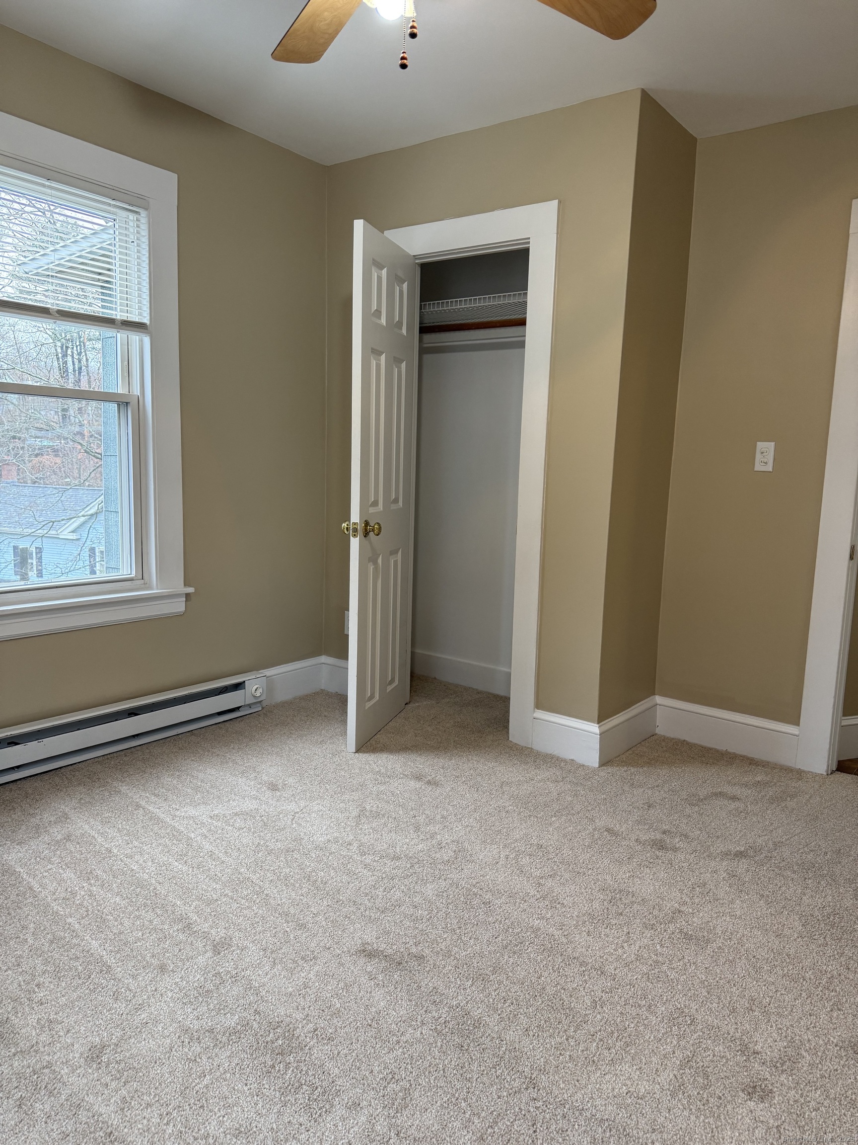 255 Main Street Plymouth, CT 06786 - Photo 11 of 14 an empty room with windows and closet