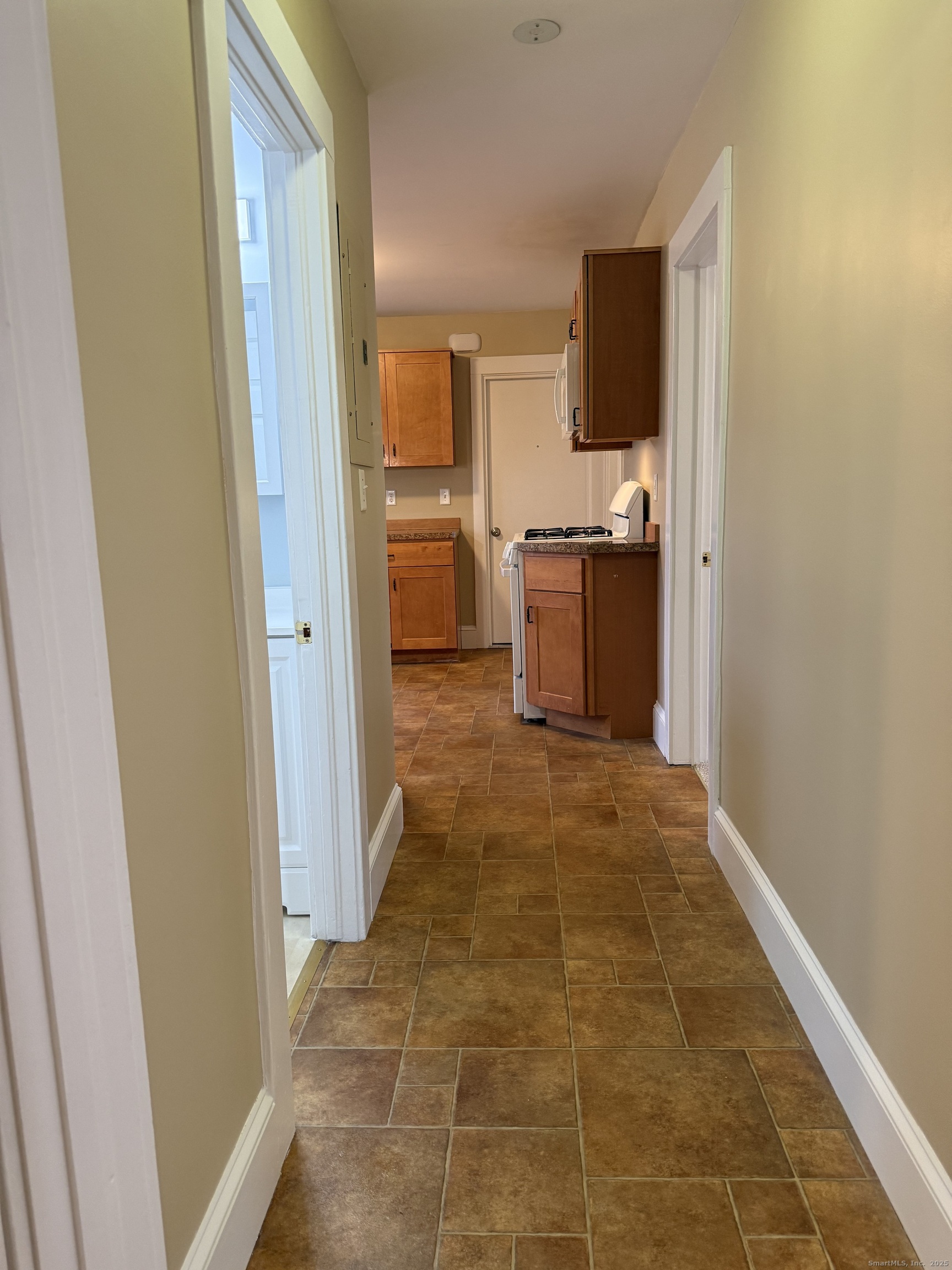 255 Main Street Plymouth, CT 06786 - Photo 4 of 14 a bathroom with a sink and a mirror