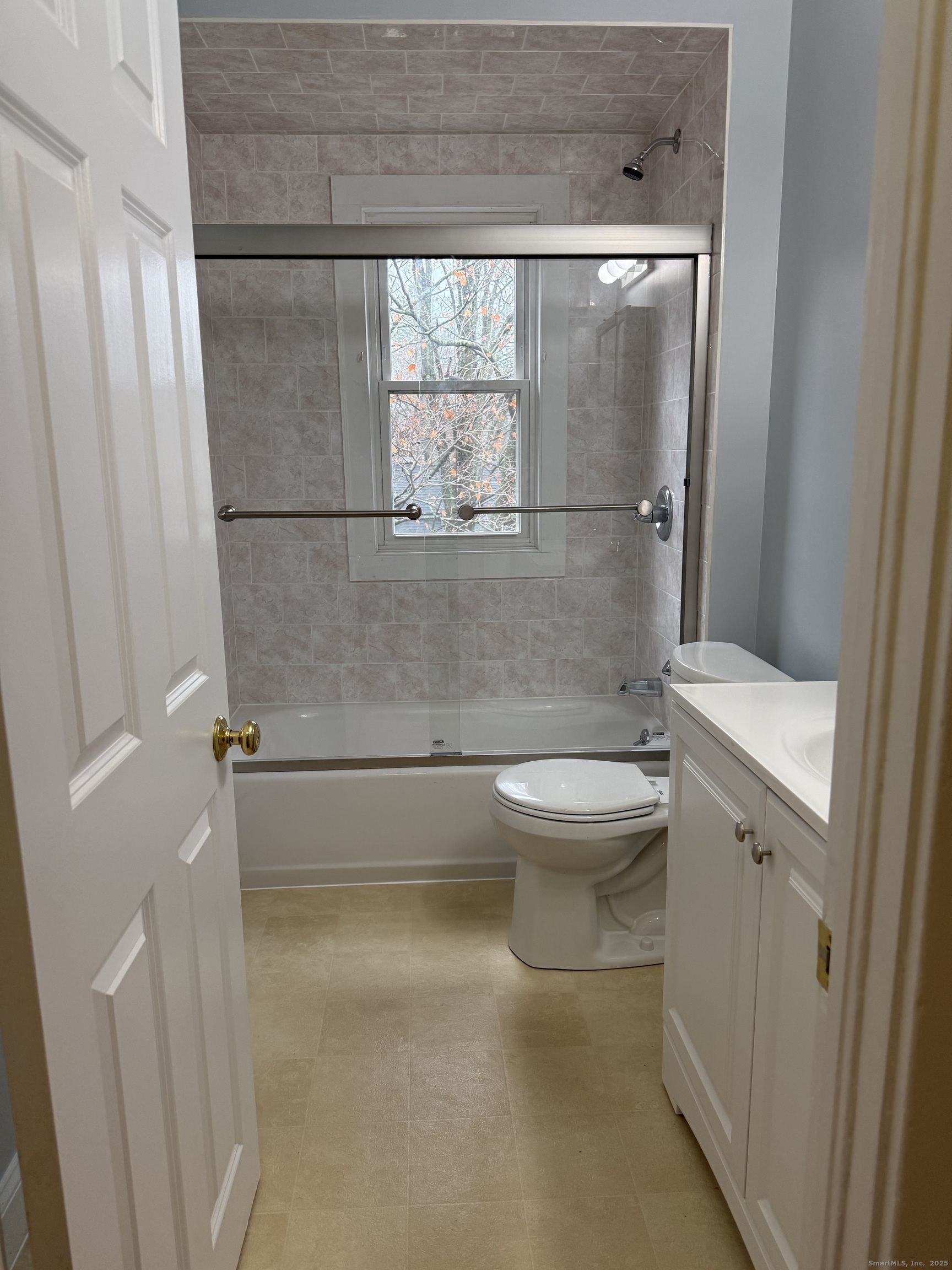 255 Main Street Plymouth, CT 06786 - Photo 8 of 14 a bathroom with a toilet and a shower