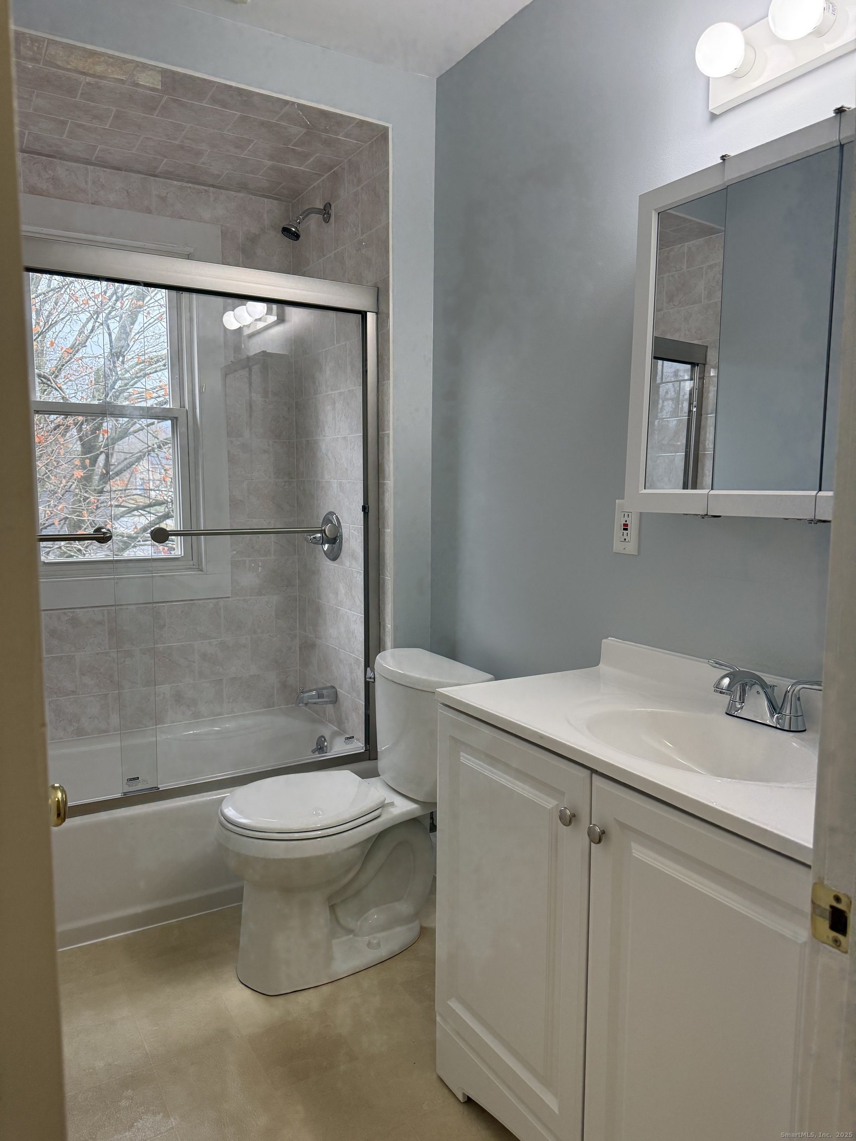 255 Main Street Plymouth, CT 06786 - Photo 9 of 14 a bathroom with a sink a toilet and a shower