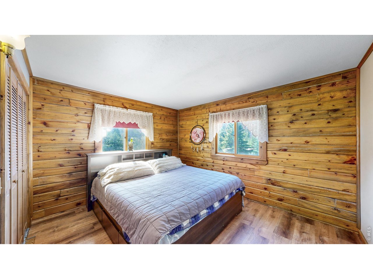 32759 Poudre Canyon Road Bellvue, CO 80512 - Photo 9 of 25 main floor primary room