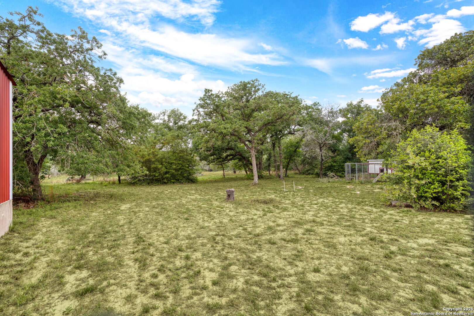 20-acres Guadalupe Ranch Lane Seguin, TX 78155 - Photo 37 of 40 a backyard of a house with lots of green space