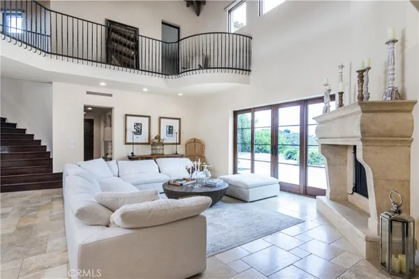 a large kitchen with lots of counter top space and stainless steel appliances