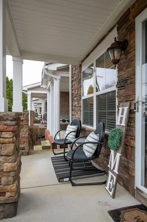 a view of patio with chairs and tables