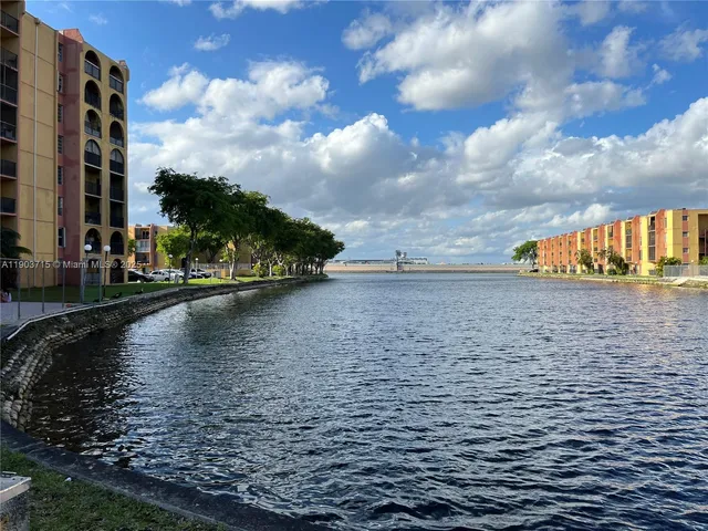 a view of swimming pool with a yard