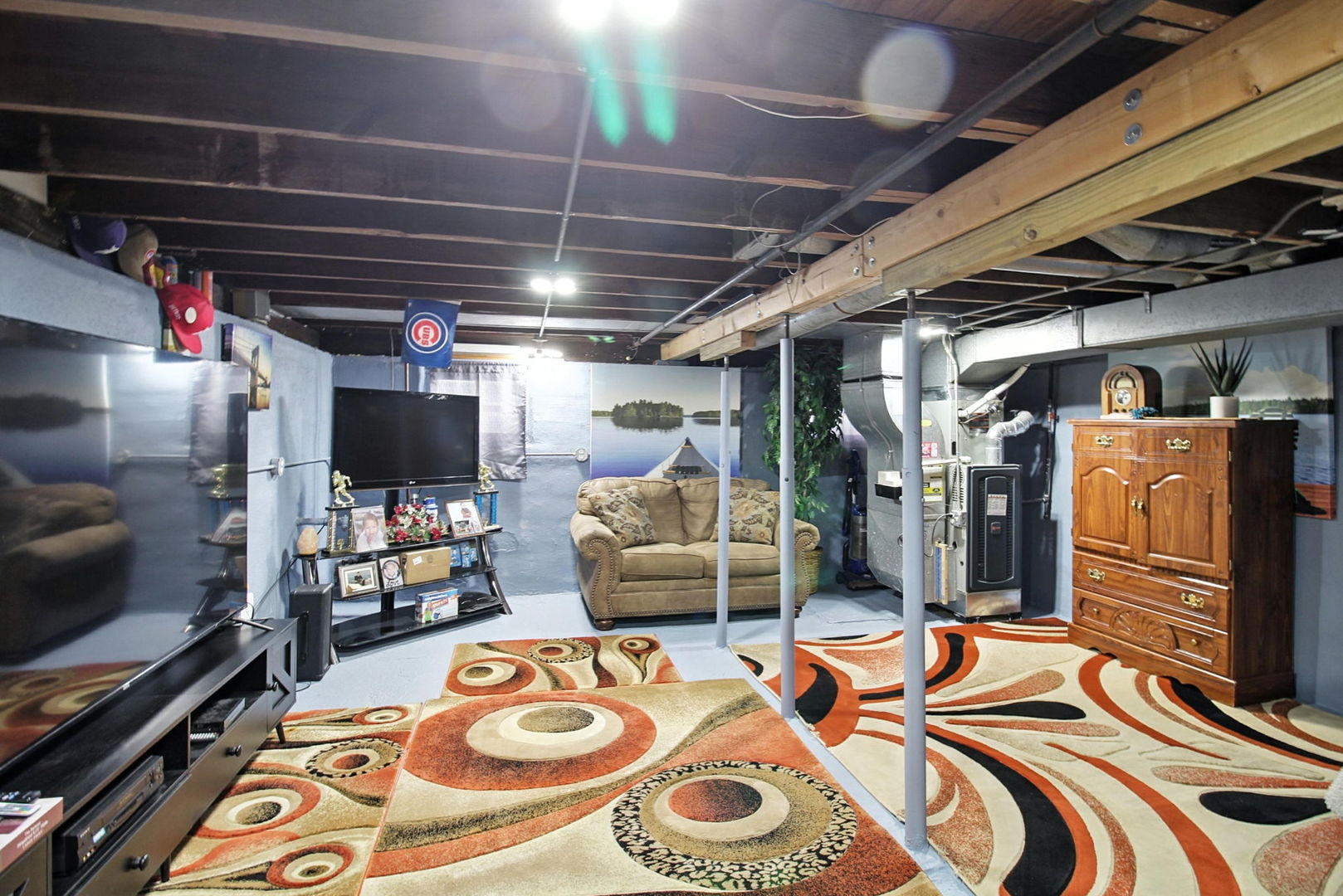 818 Morgan Street Joliet, IL 60436 - Photo 10 of 22 a outdoor space with furniture and a flat screen tv