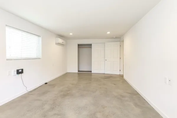 an empty room with windows