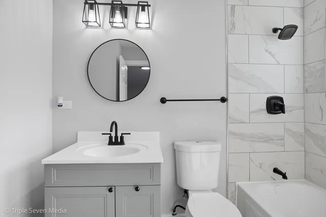 a bathroom with a sink and a toilet