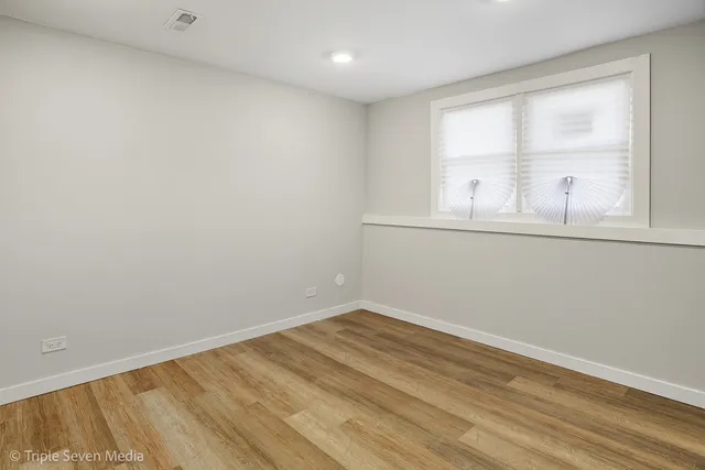 an empty room with window