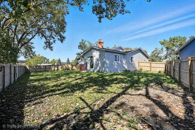 a view of a house with a big yard