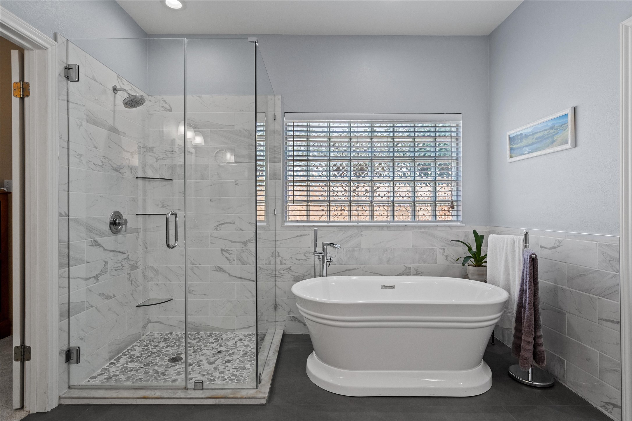 9439 Altona Way Austin, TX 78717 - Photo 15 of 40 a bathroom with a toilet and a shower