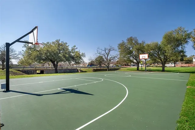 a terrace with outdoor seating and city view