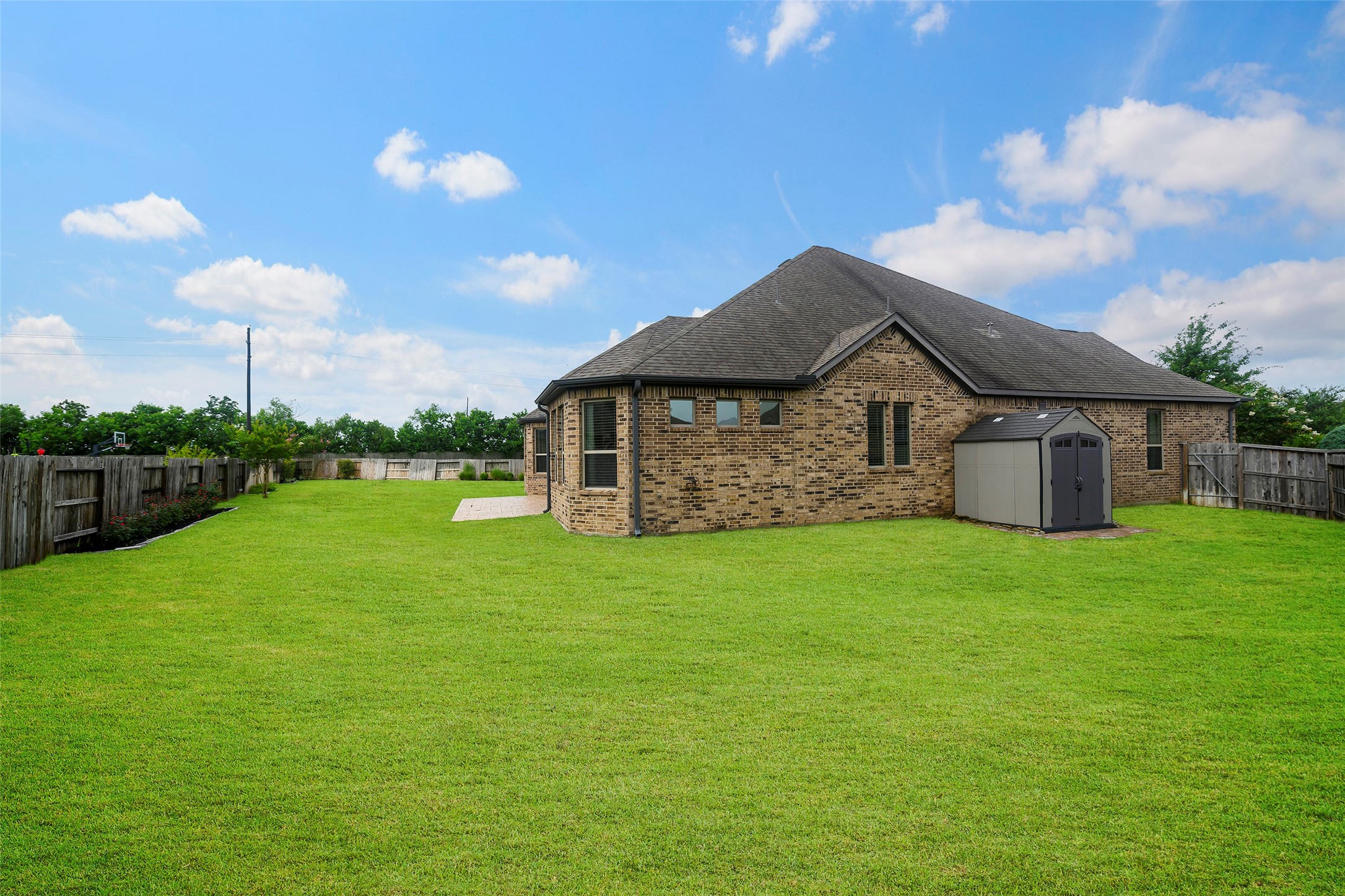 20330 Rosegold Way Spring, TX 77379 - Photo 15 of 48 Spacious backyard offers endless possibilities for a future pool, outdoor kitchen, play area, or garden.