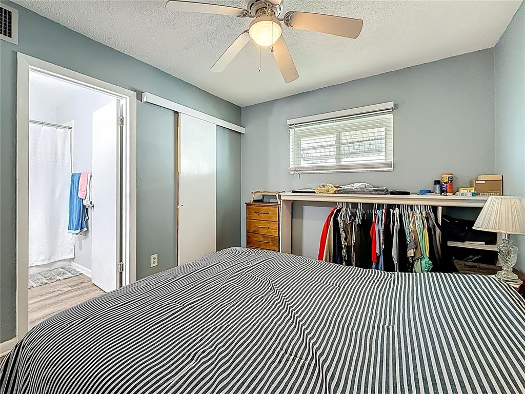 250 Rosery Road Northwest, Unit 228 Largo, FL 33770 - Photo 17 of 27 a view of a room with lots of windows