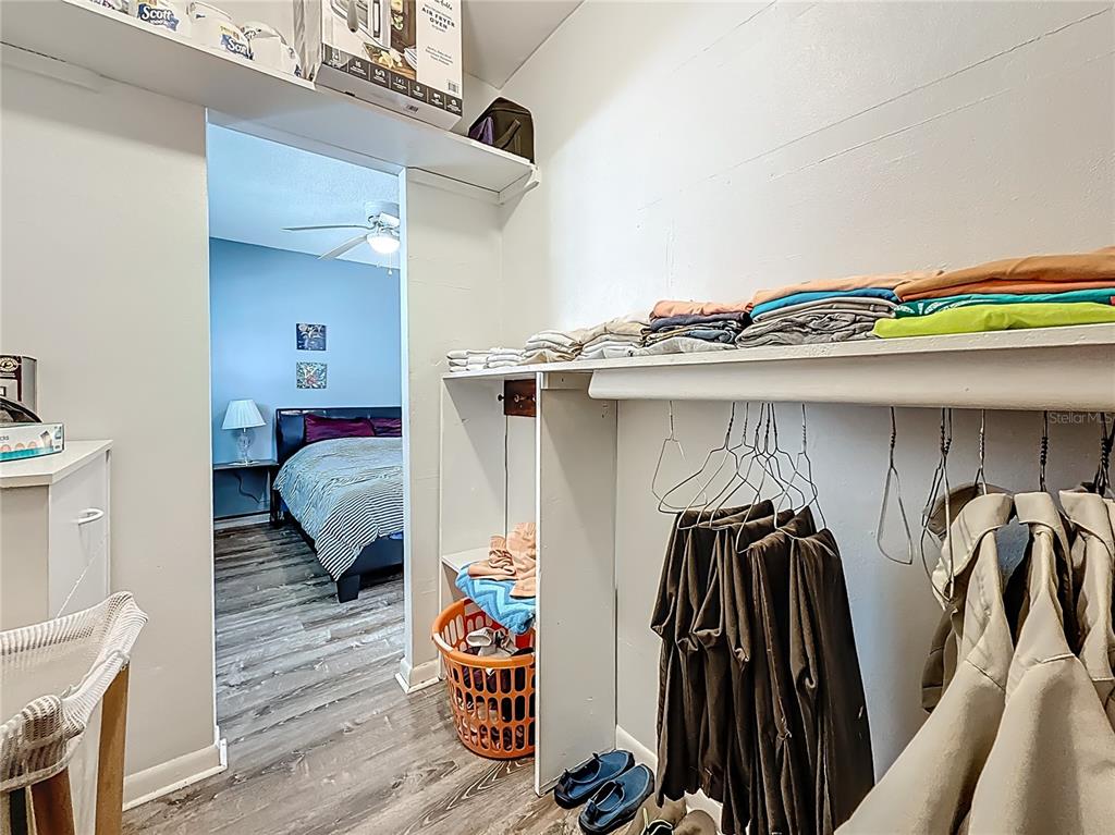 250 Rosery Road Northwest, Unit 228 Largo, FL 33770 - Photo 21 of 27 a view of a closet with storage