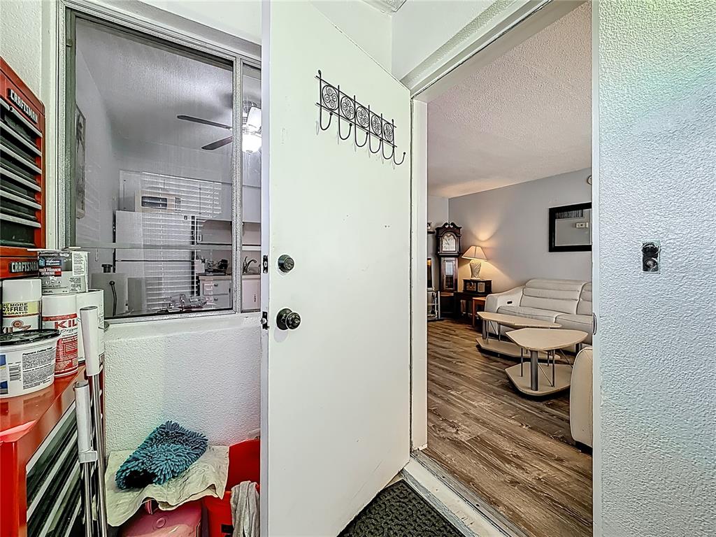 250 Rosery Road Northwest, Unit 228 Largo, FL 33770 - Photo 22 of 27 a bathroom with a sink and a mirror