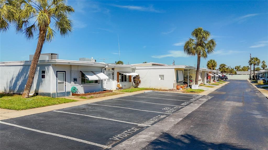 250 Rosery Road Northwest, Unit 228 Largo, FL 33770 - Photo 3 of 27 a view of a house with basketball court