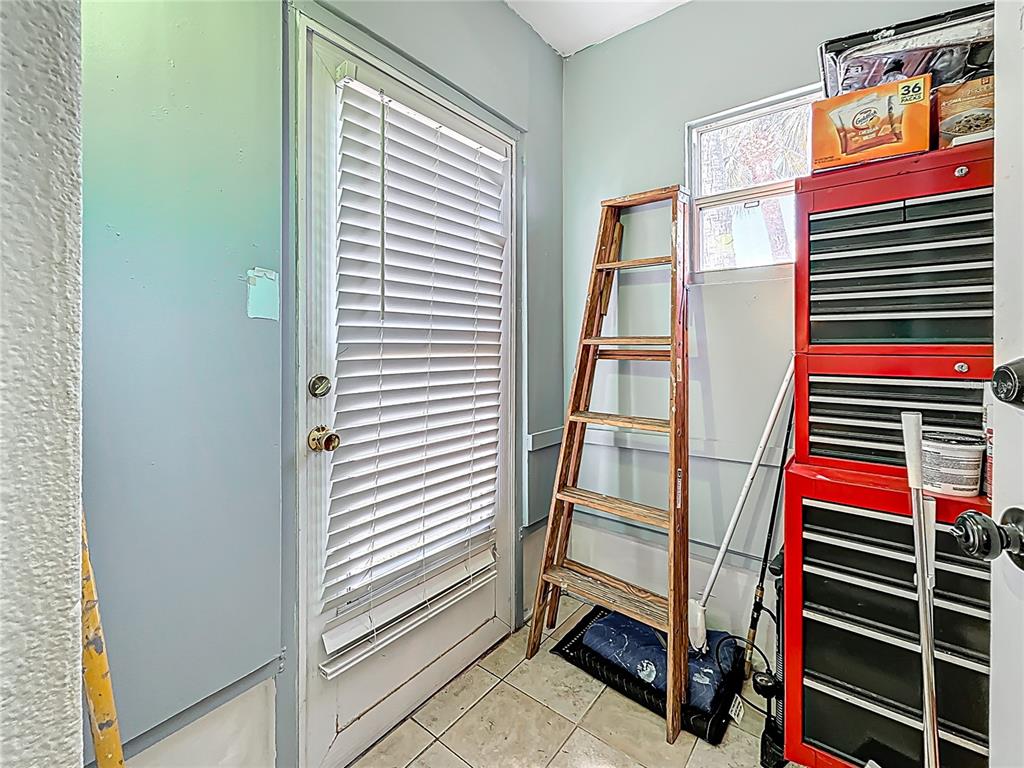 250 Rosery Road Northwest, Unit 228 Largo, FL 33770 - Photo 4 of 27 a view of storage and utility