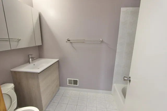 a close view of a bathtub in bathroom