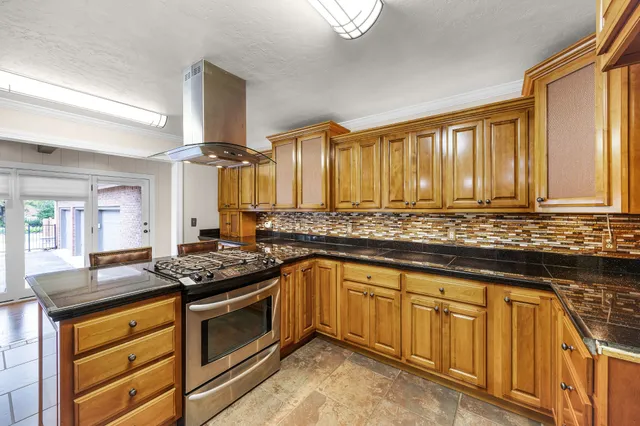 a view of a livingroom with furniture wooden floor and window