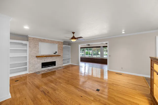 a view of a refrigerator in kitchen and wooden floor