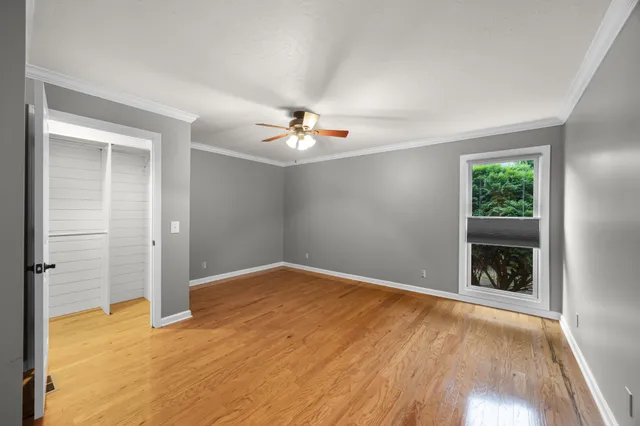 a view of a garage with wooden walls