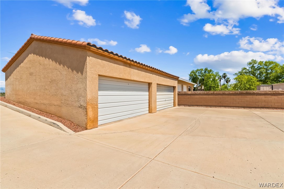 1084 Dike Road Mohave Valley, AZ 86440 - Photo 68 of 75 a view of a big room with a garage