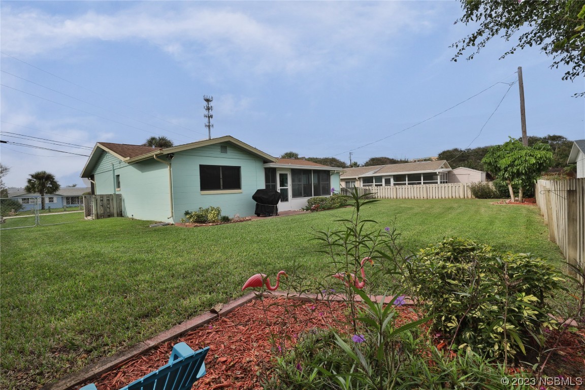 4701 South Peninsula Drive Ponce Inlet, FL 32127 - Photo 31 of 32 a view of a house with a yard
