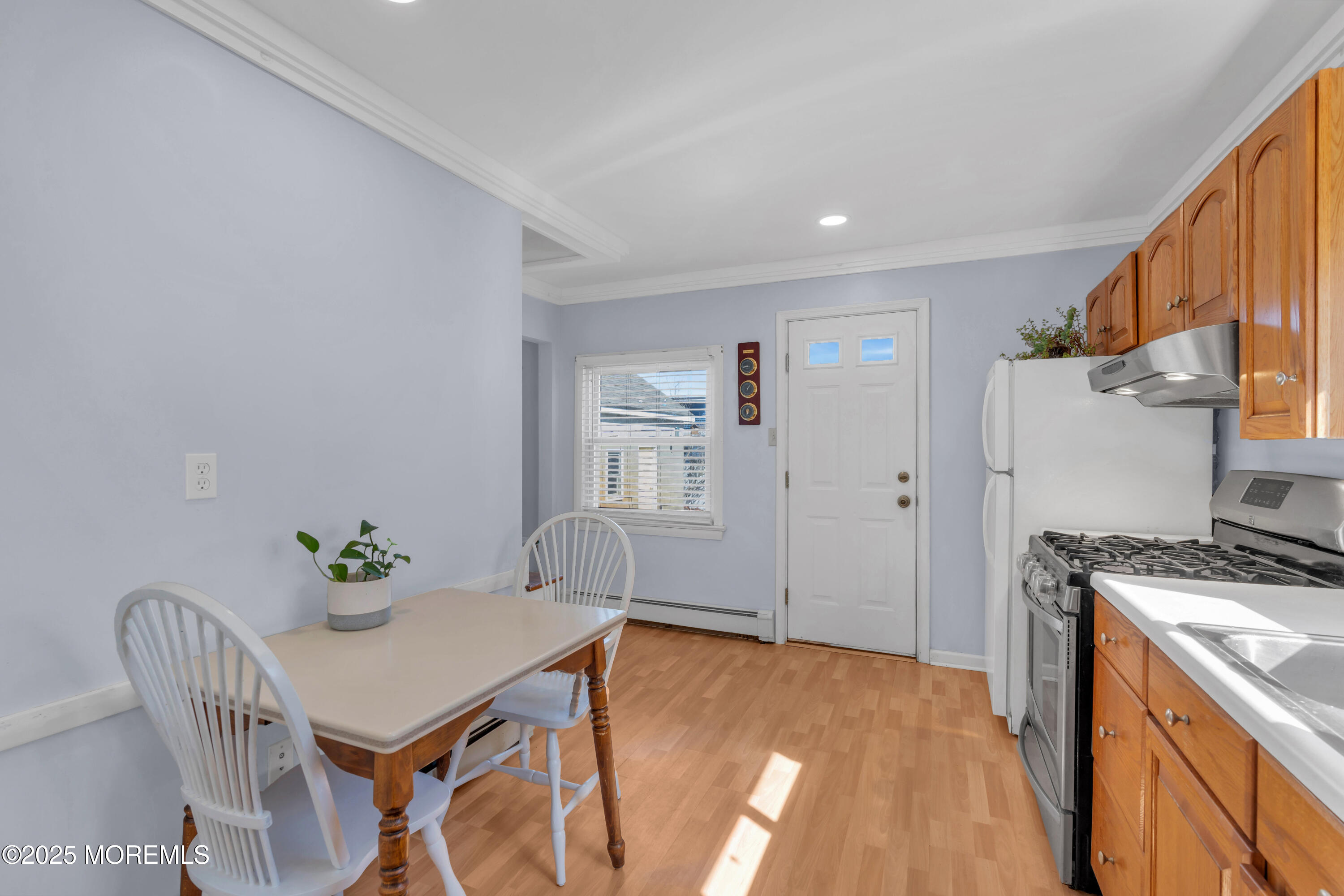 69 Pinehurst Road Brick, NJ 08723 - Photo 13 of 33 a view of a kitchen with furniture and wooden floor