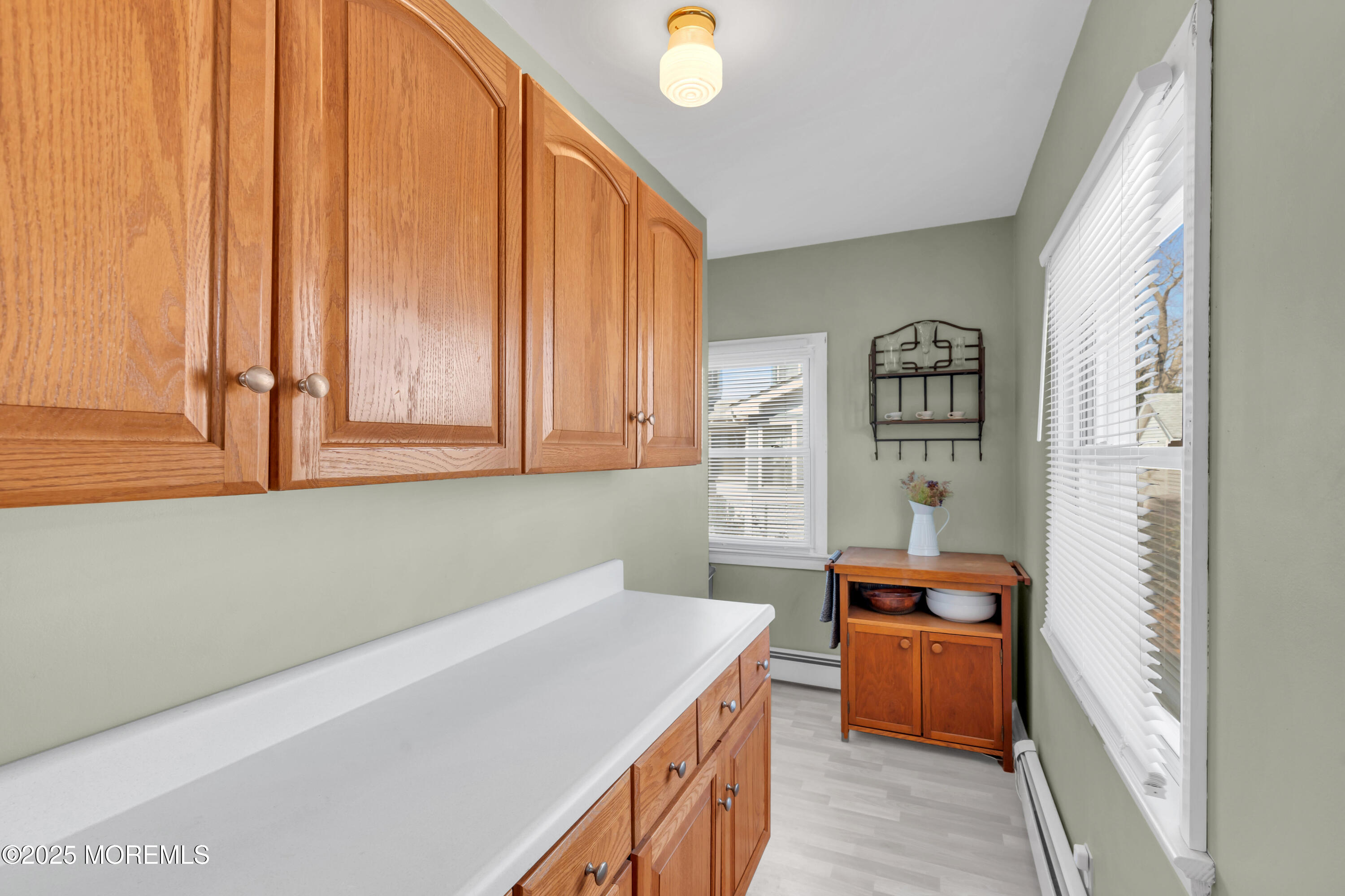 69 Pinehurst Road Brick, NJ 08723 - Photo 16 of 33 a kitchen that has a microwave and a stove