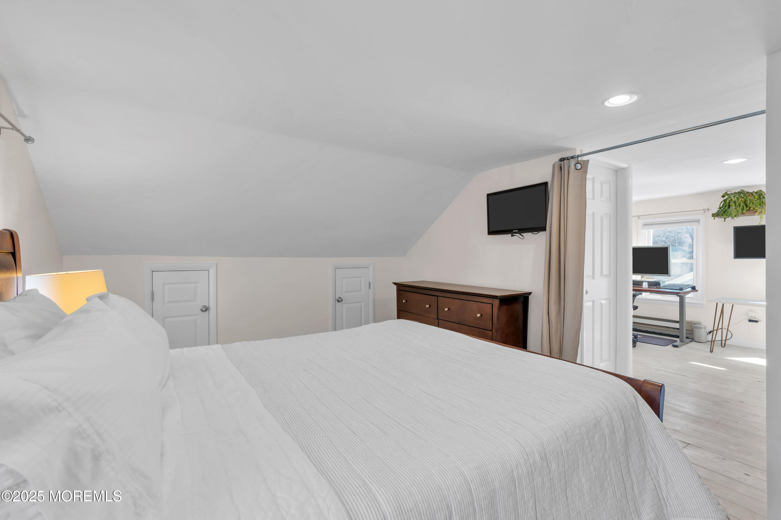 69 Pinehurst Road Brick, NJ 08723 - Photo 26 of 33 a bedroom with a bed and a flat screen tv