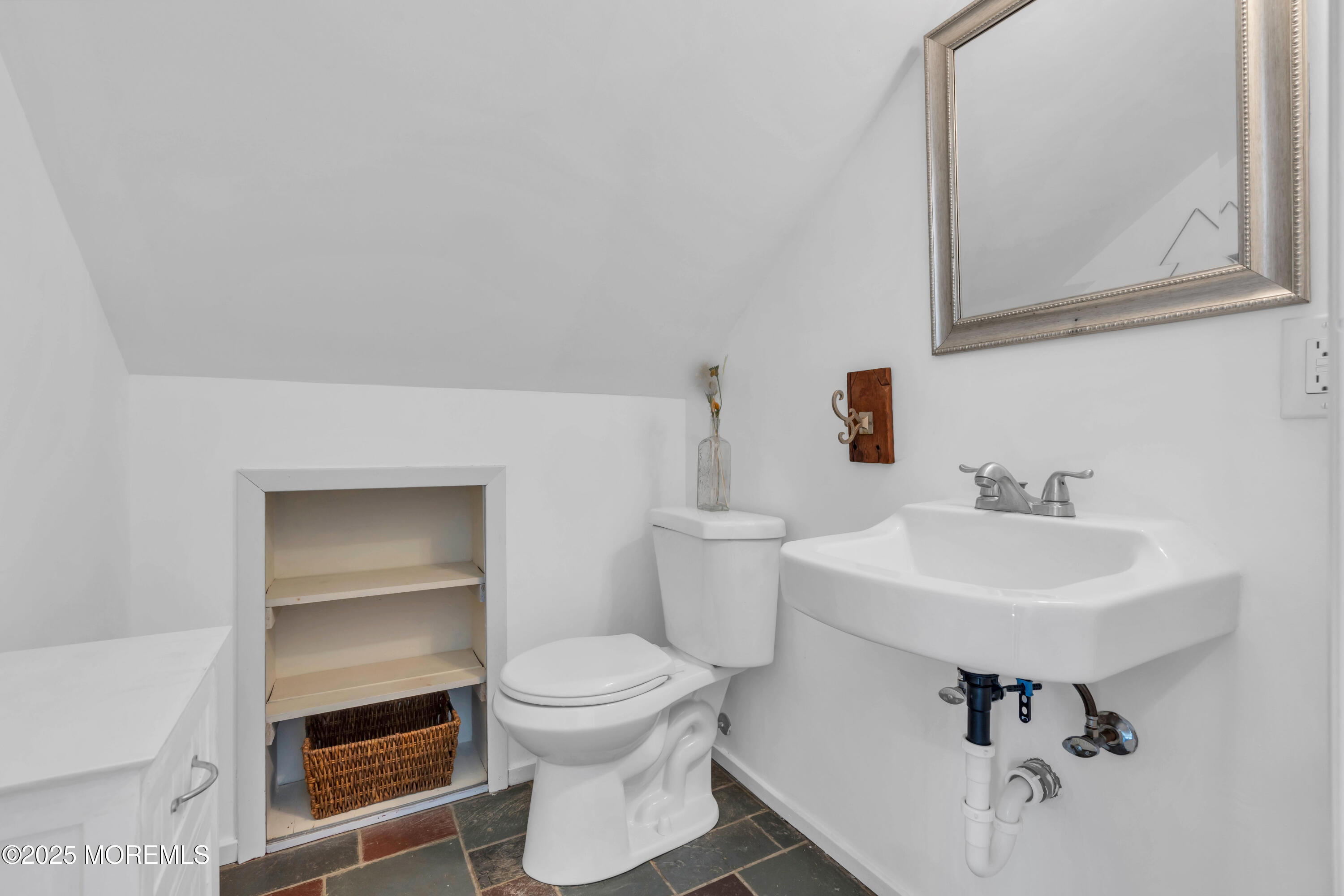 69 Pinehurst Road Brick, NJ 08723 - Photo 30 of 33 a bathroom with a sink toilet and mirror