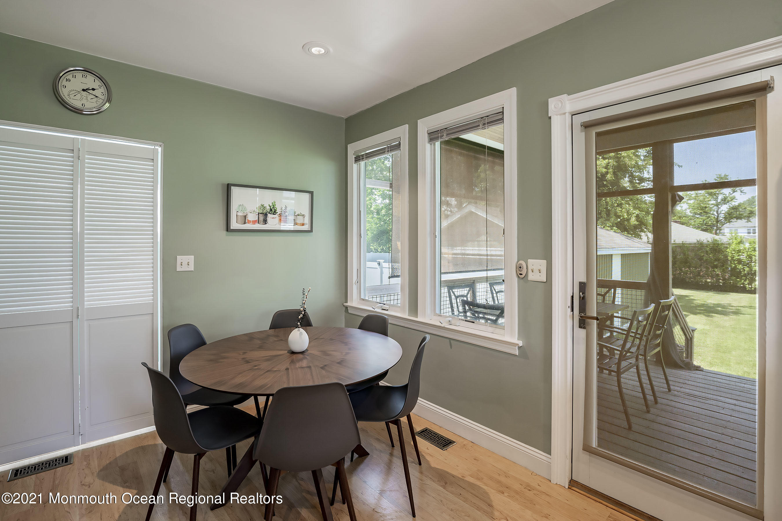 132 Sampson Place Long Branch, NJ 07740 - Photo 7 of 20 a view of a dining room with furniture window and wooden floor