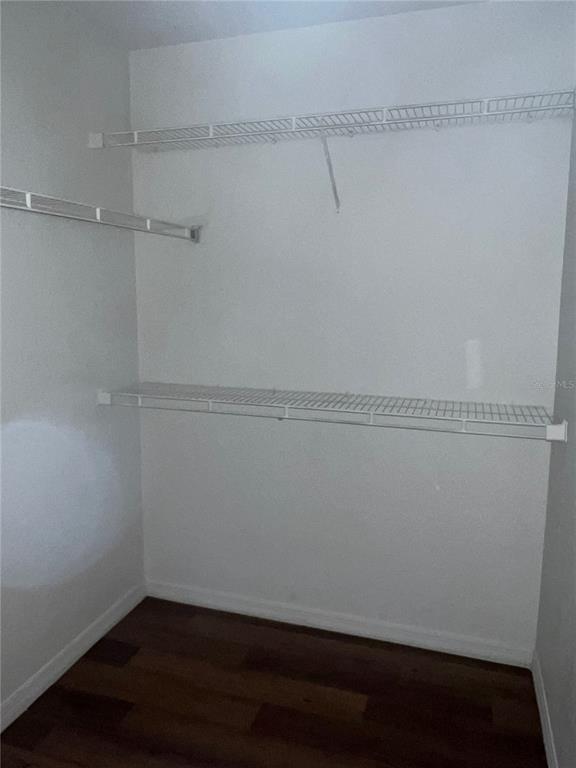 8939 Latrec Avenue, Unit 1205 Orlando, FL 32819 - Photo 13 of 15 a view of small space with racks on the wall