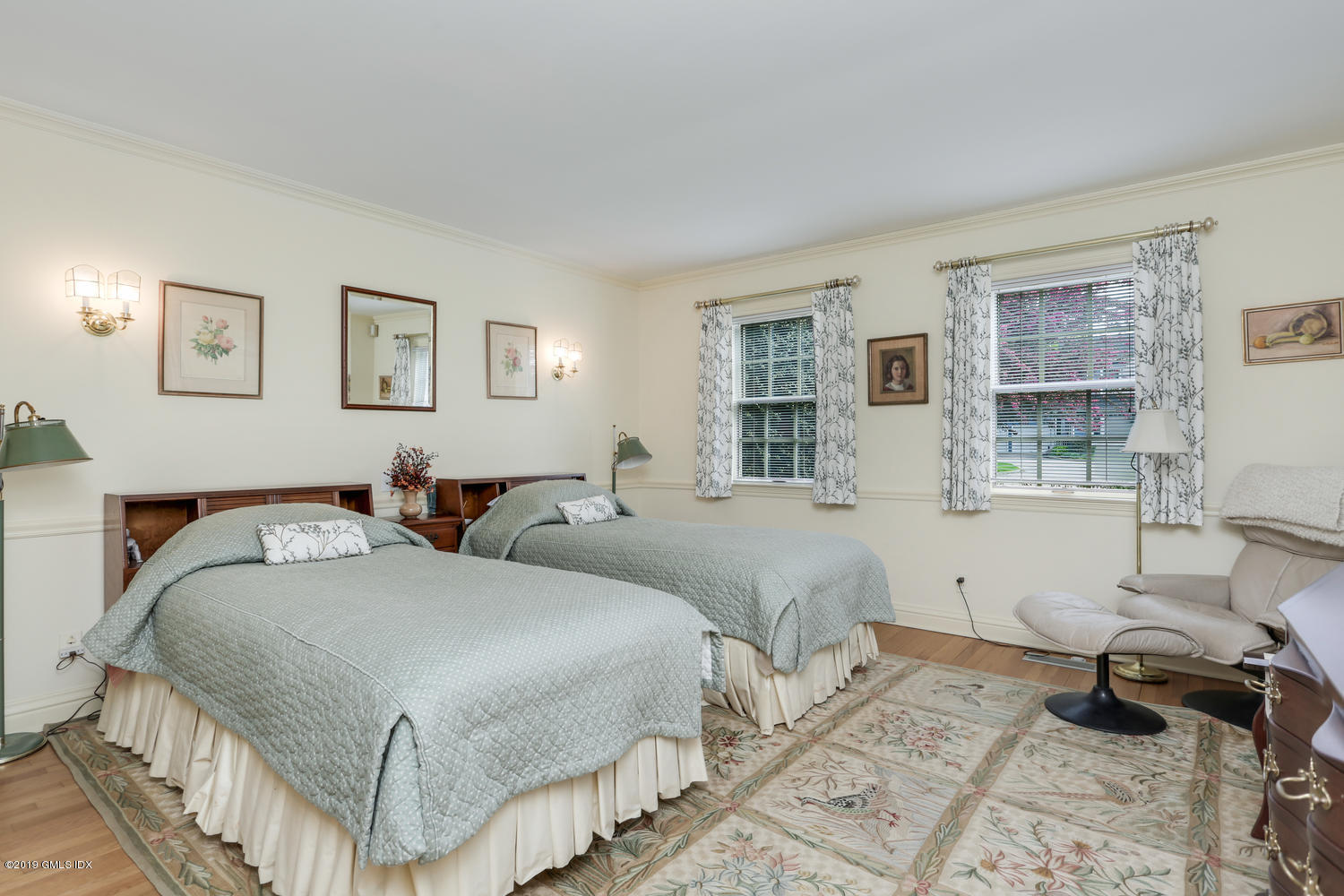 11 Wahneta Road Old Greenwich, CT 06870 - Photo 19 of 26 a bedroom with two beds and painting on the wall