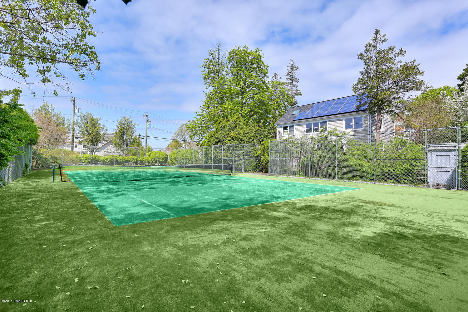 11 Wahneta Road Old Greenwich, CT 06870 - Photo 22 of 26 a view of a house with a yard