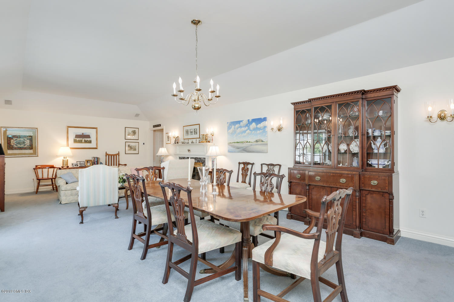 11 Wahneta Road Old Greenwich, CT 06870 - Photo 4 of 26 a view of a dining room with furniture a chandelier and wooden floor