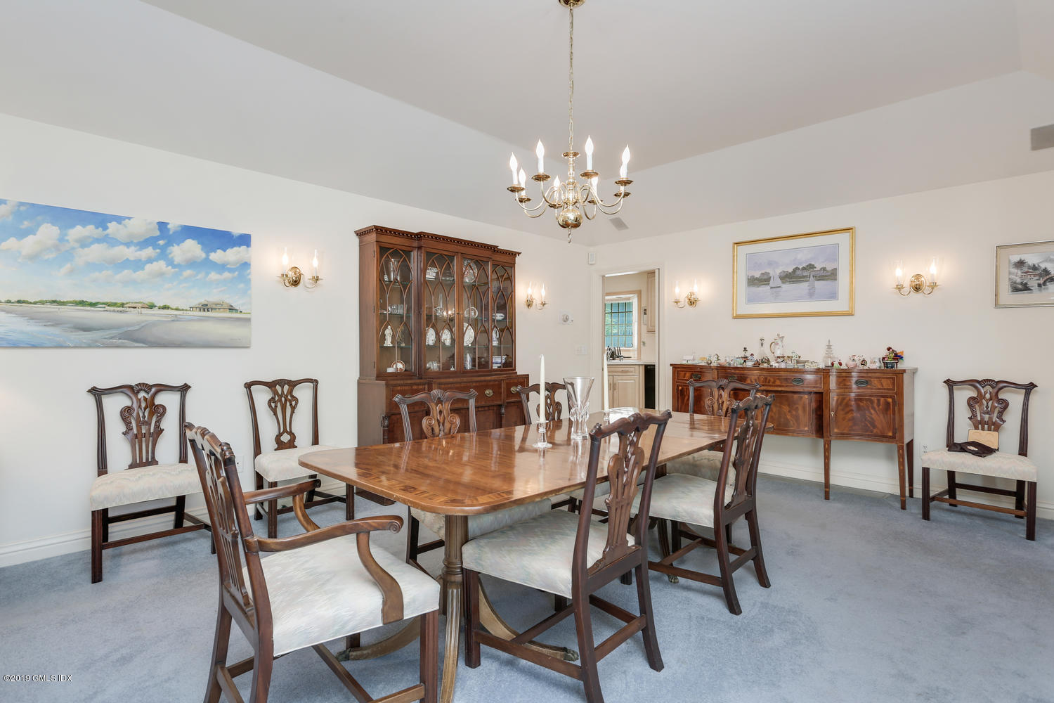 11 Wahneta Road Old Greenwich, CT 06870 - Photo 6 of 26 a view of a dining room with furniture and chandelier