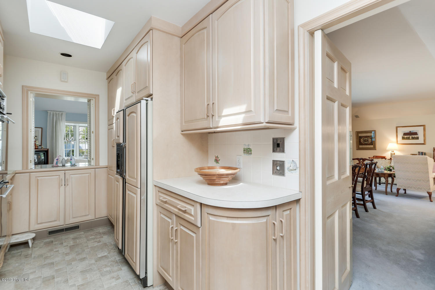 11 Wahneta Road Old Greenwich, CT 06870 - Photo 9 of 26 a utility room with cabinets washer and dryer