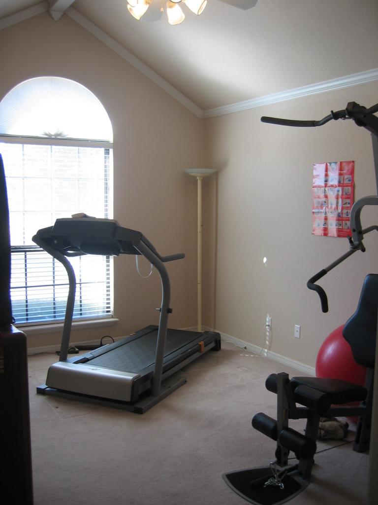 711 McKenzie Road Amarillo, TX 79118 - Photo 14 of 38 a room with gym equipment
