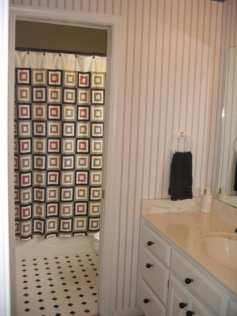 711 McKenzie Road Amarillo, TX 79118 - Photo 18 of 38 a close view of a sink and a cabinet