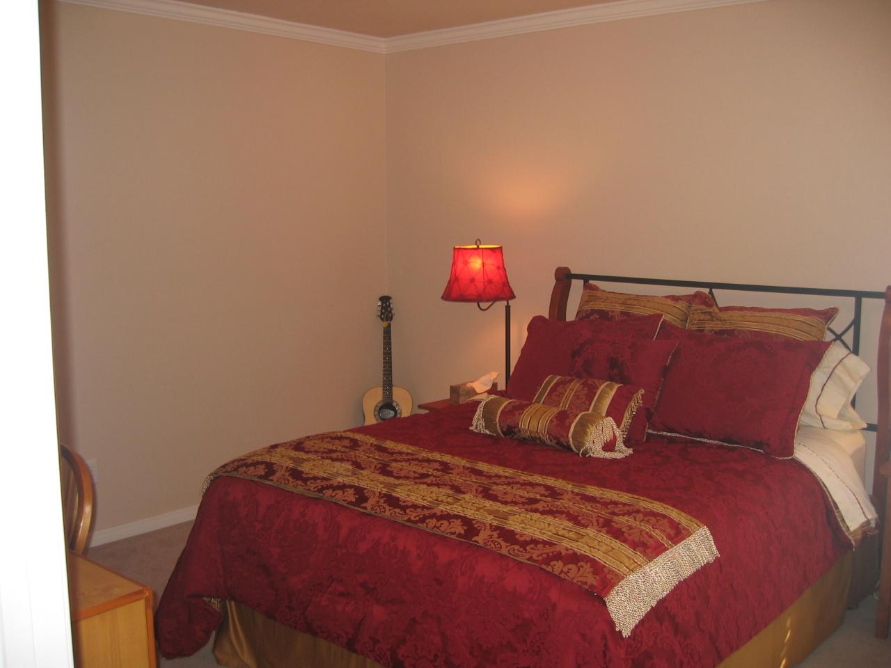 711 McKenzie Road Amarillo, TX 79118 - Photo 19 of 38 a bedroom with a bed and a closet
